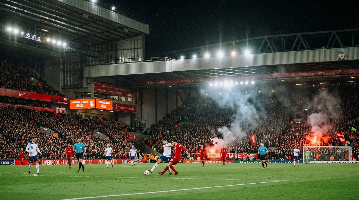 Campo de fútbol profesional visto desde la tribuna con jugadores en acción durante un partido nocturno de Bundesliga